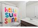 Bright bathroom with a colorful shower curtain and modern vanity at 558 Wynfield Forest Dr, Summerville, SC 29485