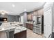 Spacious kitchen with stainless steel appliances and granite countertops at 558 Wynfield Forest Dr, Summerville, SC 29485