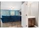 Bright living room adjacent to half bathroom with vinyl floors, modern furniture, and natural light at 558 Wynfield Forest Dr, Summerville, SC 29485