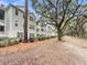 Beautifully landscaped exterior with lush trees and shrubs create a peaceful living environment at 60 Fenwick Hall Allee # 314, Johns Island, SC 29455