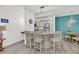 Open kitchen layout with granite island, stainless steel appliances, and a dining area at 60 Fenwick Hall Allee # 314, Johns Island, SC 29455