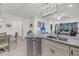 Kitchen with stone counters, stainless steel dishwasher and open to living space at 60 Fenwick Hall Allee # 314, Johns Island, SC 29455