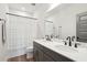 Bathroom featuring a double sink vanity, a large mirror, and modern fixtures with a shower tub combo at 643 Blueway Ave, Summerville, SC 29486