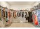 Organized walk-in closet featuring ample hanging space and shelving for clothes and accessories at 643 Blueway Ave, Summerville, SC 29486