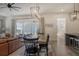 Open-concept living space with a dining area and view to outdoor living at 643 Blueway Ave, Summerville, SC 29486