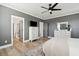 Open Primary bedroom with adjacent bathroom, walk in shower and a gray color scheme at 643 Blueway Ave, Summerville, SC 29486