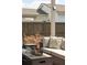 Cozy outdoor seating area with plush cushions and a modern fire pit, perfect for evening relaxation at 643 Blueway Ave, Summerville, SC 29486