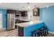 Modern kitchen with stainless steel appliances, and breakfast bar at 716 W 3Rd N St, Summerville, SC 29483