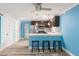 Open kitchen featuring stainless steel appliances, and breakfast bar seating at 716 W 3Rd N St, Summerville, SC 29483
