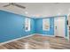 Bright living room with windows, stylish flooring and modern finishes at 716 W 3Rd N St, Summerville, SC 29483