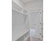 Mudroom area with custom shelving and coat rack providing style and functionality at 747 Maynard Ln, Summerville, SC 29486