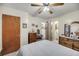 Bedroom featuring a full bed, dresser, and doorway leading to the bathroom at 7753 Linsley Dr, North Charleston, SC 29418