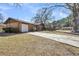 Well-maintained brick home with an attached garage and a long driveway offers convenience and charm at 7753 Linsley Dr, North Charleston, SC 29418