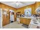 Functional kitchen with wood cabinets, laminate countertops and appliances at 7753 Linsley Dr, North Charleston, SC 29418