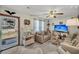 Cozy living room with plush seating, neutral colors, and natural light creates a relaxing atmosphere at 7753 Linsley Dr, North Charleston, SC 29418