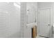 Bright bathroom featuring subway tile shower, white trim and a glass shower partition at 804 S Pointe Blvd, Summerville, SC 29483