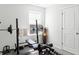 Bright gym area with free weights, bench, and natural lighting at 804 S Pointe Blvd, Summerville, SC 29483