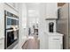 Bright and functional kitchen area showcases built-in oven and counter space with a seamless flow to a dining area at 804 S Pointe Blvd, Summerville, SC 29483