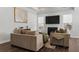 A cozy living room featuring modern sofas, fireplace with mantel, and recessed lighting at 804 S Pointe Blvd, Summerville, SC 29483
