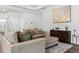 Open living area showcases a stylish sofa, modern decor, and decorative wall art at 804 S Pointe Blvd, Summerville, SC 29483