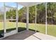 Screened in porch with views of a large yard, a haven for outdoor relaxation at 804 S Pointe Blvd, Summerville, SC 29483