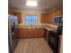 Well-equipped kitchen with stainless steel appliances, wooden cabinets, and modern countertops at 9044 Greenbriar Dr, Summerville, SC 29485