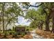 Welcoming entrance to the community with lush landscaping and mature trees at 1001 Middleton Dr Dr, Goose Creek, SC 29445