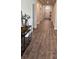 Inviting hallway with hardwood floors and a glimpse of the front door and coffered ceilings at 1001 Middleton Dr Dr, Goose Creek, SC 29445