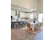 Spacious kitchen boasts a large island with seating, stainless appliances, and an adjacent dining area at 1001 Middleton Dr Dr, Goose Creek, SC 29445