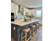 Modern kitchen featuring white cabinets, stainless steel appliances, a large island and counter seating at 1001 Middleton Dr Dr, Goose Creek, SC 29445