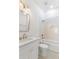 Stylish bathroom showcases a modern vanity, gold fixtures, and a checkered-tile shower and tub combo at 1014 Alamo St, North Charleston, SC 29405