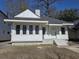 Charming, freshly painted two-story home with a gabled roof and neat front yard at 1014 Alamo St, North Charleston, SC 29405