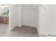 Walk-in closet with carpet floors and wire rack shelving next to the door way to the bathroom at 1022 Drakeford St # 10P, Saint George, SC 29477