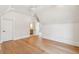Bright bedroom with hardwood floors, ceiling fan, and an attached bathroom at 105 Peninsula Dr, Ravenel, SC 29470