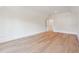 Spacious bedroom features wood floors, white walls, and access to an adjoining room at 105 Peninsula Dr, Ravenel, SC 29470