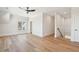 Airy bedroom with hardwood floors, a ceiling fan, and large windows at 105 Peninsula Dr, Ravenel, SC 29470