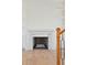 Elegant fireplace with marble surround and herringbone brick interior adds warmth and style to the living space at 105 Peninsula Dr, Ravenel, SC 29470