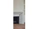 White fireplace in a blurred image at 105 Peninsula Dr, Ravenel, SC 29470