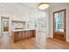 Spacious kitchen with a large island, stainless steel appliances, and open layout at 105 Peninsula Dr, Ravenel, SC 29470