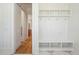 Custom mudroom boasts coat hooks, bench seating, and convenient storage shelves at 105 Peninsula Dr, Ravenel, SC 29470