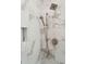 Modern shower features marble-patterned tile walls with dual shower heads and a built-in niche at 105 Peninsula Dr, Ravenel, SC 29470