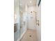 Sleek glass-enclosed shower with modern gold fixtures and marble tile, creating a spa-like retreat at 105 Peninsula Dr, Ravenel, SC 29470