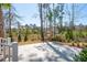 View of the front yard of this home including the driveway and landscaping at 105 Peninsula Dr, Ravenel, SC 29470