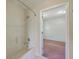 Bathroom adjacent to a bedroom featuring neutral fixtures and a shower-tub combination at 106 Mayrant St, Summerville, SC 29483
