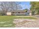 The home features a large front yard and covered porch at 106 Mayrant St, Summerville, SC 29483