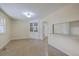 Bright kitchen showcasing built-in cabinets, a breakfast bar, and tile flooring with seamless transitions at 106 Mayrant St, Summerville, SC 29483