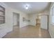 Open layout showcasing the eat-in kitchen and adjacent dining area, connected by a breakfast bar and tile flooring at 106 Mayrant St, Summerville, SC 29483