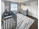 Bright Bedroom with a crib, soft rug, and dresser offering ample storage for a cozy and practical space at 107 Hainsworth Dr, North Charleston, SC 29418