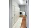 Bright laundry room with washer, dryer, storage, and a soft, stylish rug at 107 Hainsworth Dr, North Charleston, SC 29418