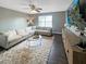 Inviting living room featuring a plush sectional sofa, soft rug, and natural light, perfect for relaxation at 107 Hainsworth Dr, North Charleston, SC 29418
